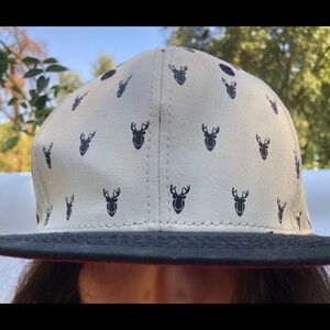Jeff hat with deer, tan and black
